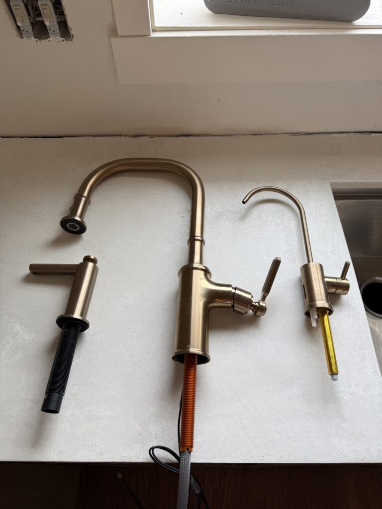 Moen Smythe Motion Sense Faucet, Reverse Osmosis Faucet, and Soap dispenser in Bronze Gold